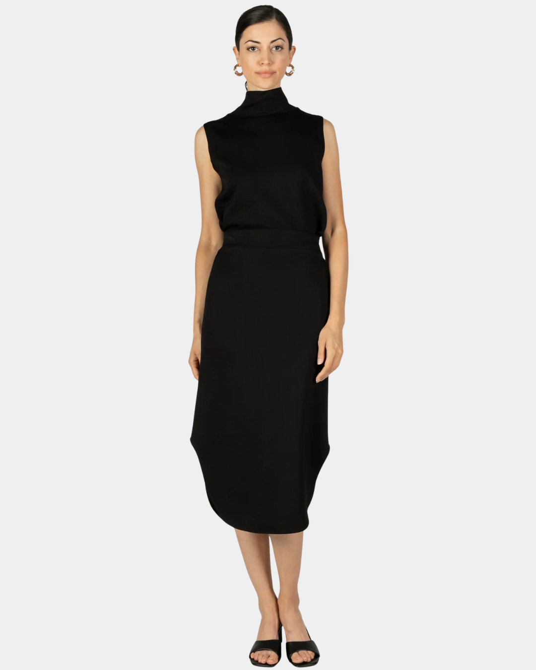 Front view of the P.CILL Diana Butter Modal Midi Skirt in Black styled on model