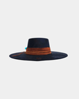 Front view of the Petra Savage Tasha Boater Crown Hat in black featuring a structured flat crown and wide brim silhouette.