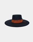 Front view of the Petra Savage Tasha Boater Crown Hat in black featuring a structured flat crown and wide brim silhouette.