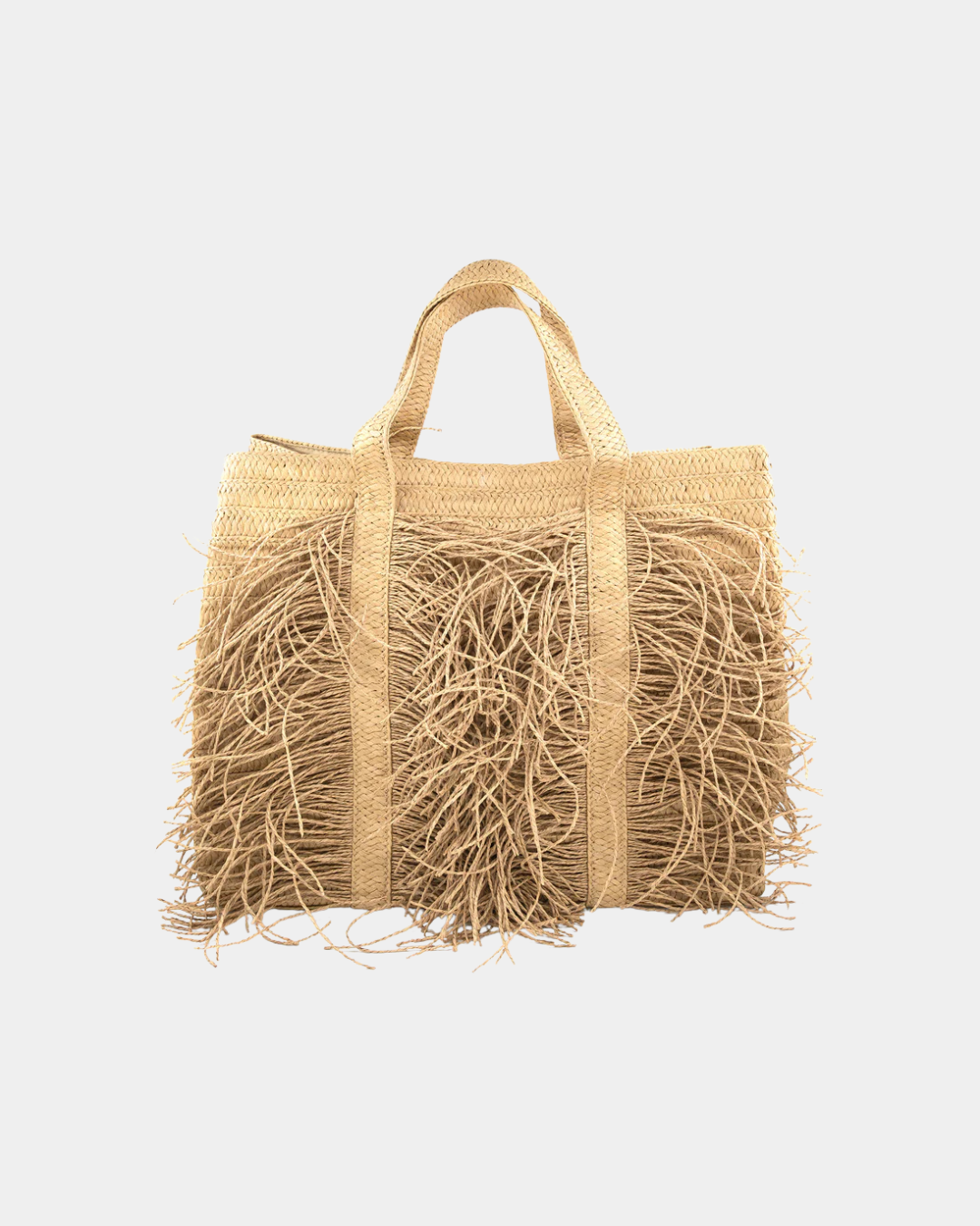 Sahara fringe raffia tote bag in natural color featuring woven texture and oversized silhouette on a neutral background.