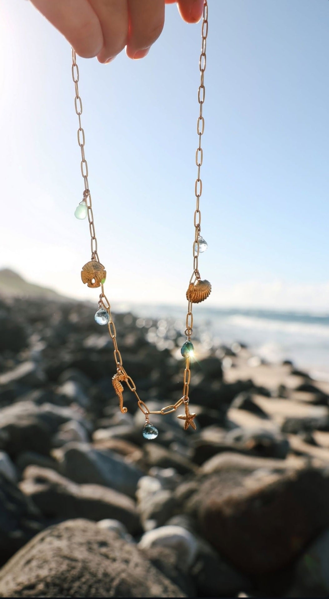 Handcrafted sealife charm necklace inspired by ocean symbols at beach