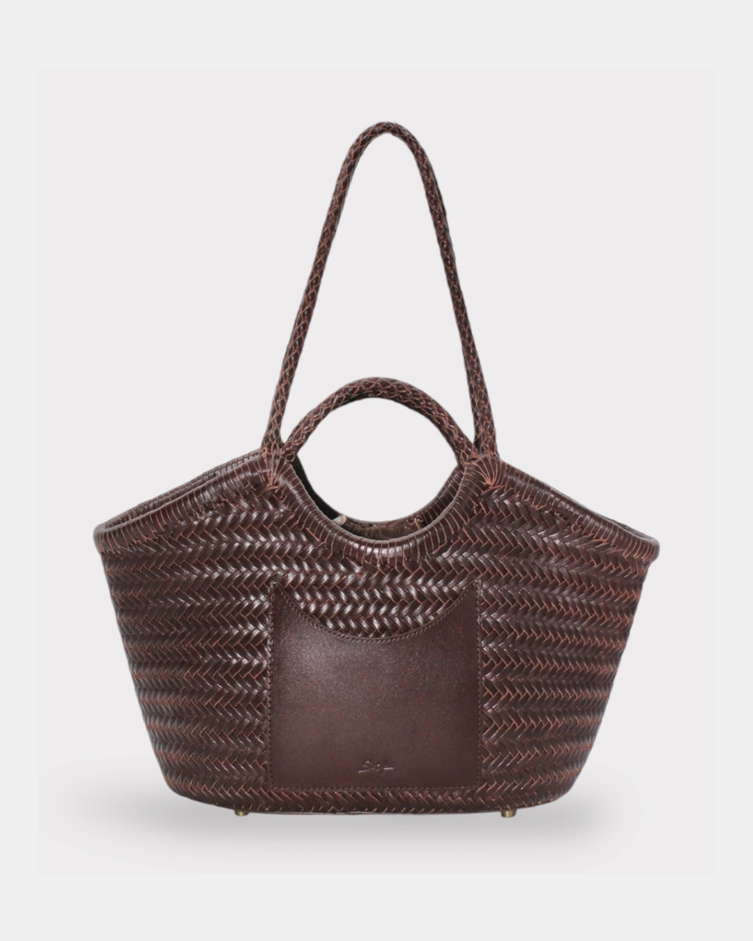 The Sook Sustainable Celia artisan woven leather tote shown from the front with a structured, handcrafted silhouette.