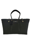 Sustainable luxury black handbag designed to fit a 16 inch laptop
