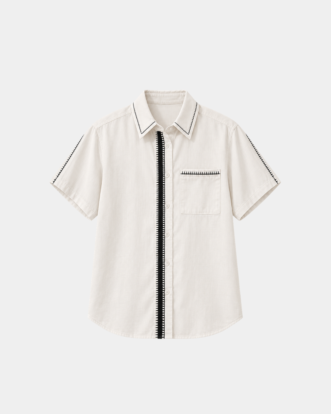 Modern Muse Button Down Blouse in ivory, flat lay front view with black contrast stitching on the collar, placket, chest pocket and sleeves