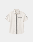 Modern Muse Button Down Blouse in ivory, flat lay front view with black contrast stitching on the collar, placket, chest pocket and sleeves
