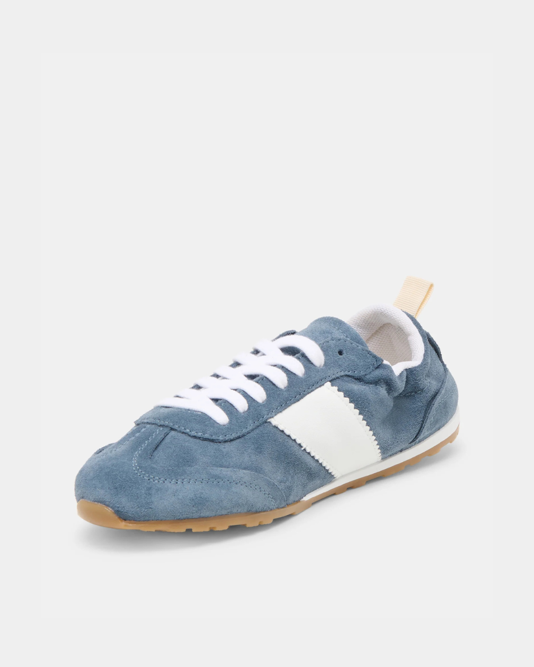 Blue suede sneaker from Dolce Vita Shyla offering a polished off-duty look.